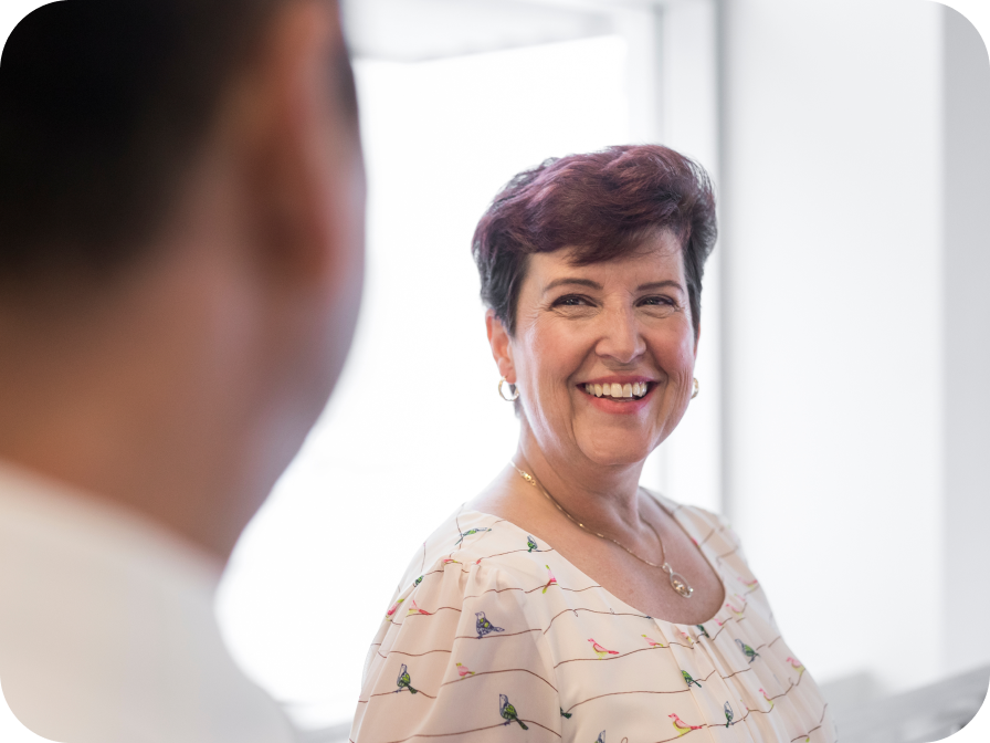 woman looking in mirror