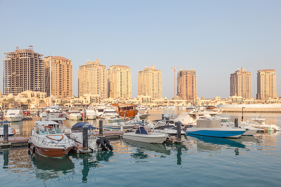 Docked boats in river